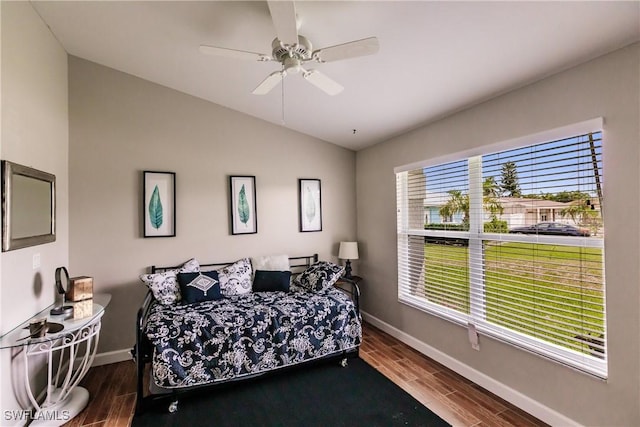 bedroom with ceiling fan and lofted ceiling