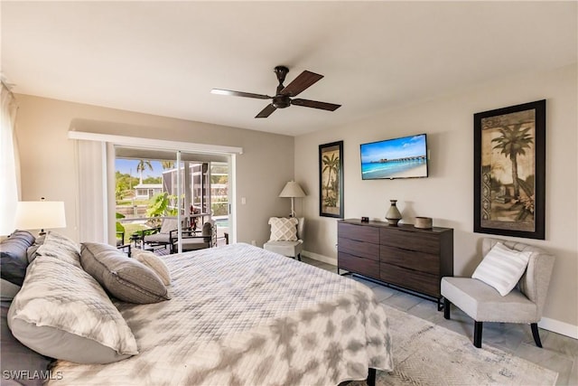 bedroom featuring access to outside and ceiling fan