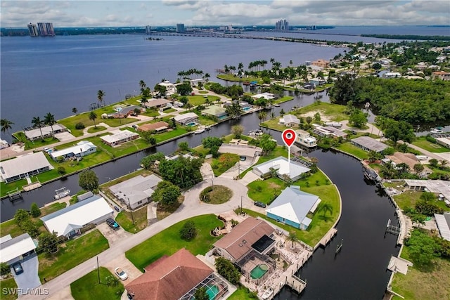 drone / aerial view with a water view