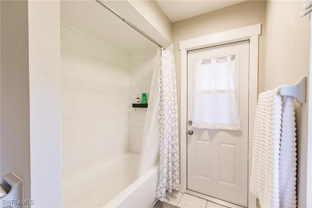 bathroom featuring tile patterned floors and shower / tub combo