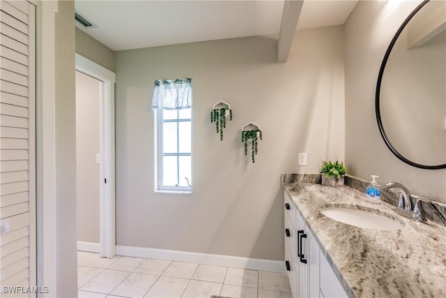 bathroom featuring vanity