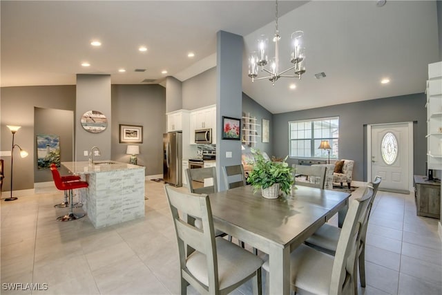 dining room with a chandelier, recessed lighting, visible vents, and light tile patterned flooring