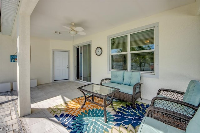 view of patio featuring ceiling fan and an outdoor living space