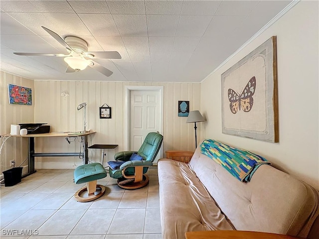 tiled living area featuring a ceiling fan