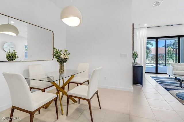 dining room featuring light tile patterned floors