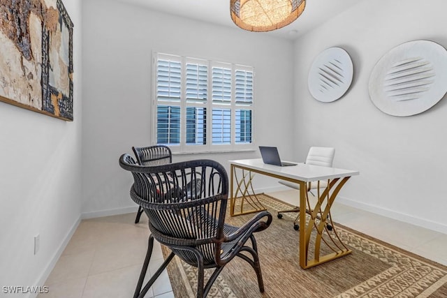 office area featuring light tile patterned flooring