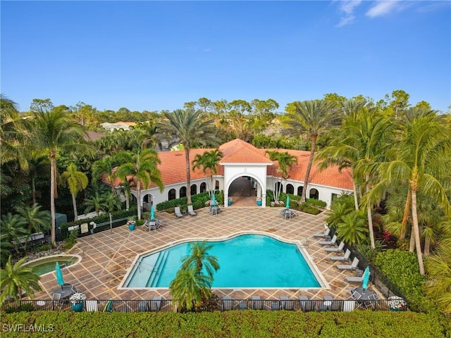 view of swimming pool featuring a patio