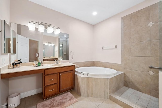 bathroom featuring vanity, tile patterned flooring, and independent shower and bath