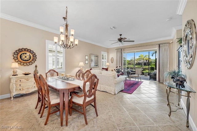 dining room featuring light tile patterned floors, ceiling fan with notable chandelier, visible vents, baseboards, and crown molding