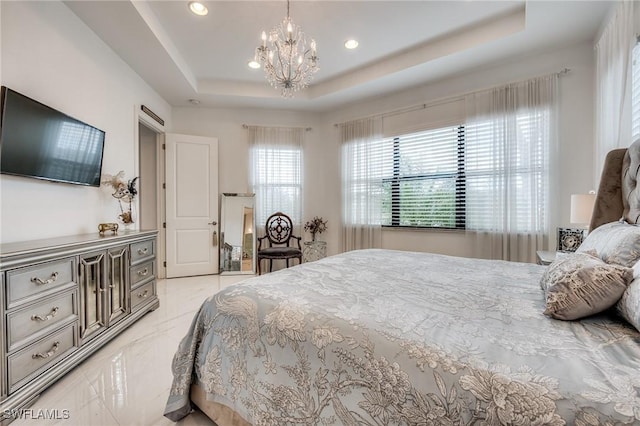 bedroom featuring an inviting chandelier, marble finish floor, a raised ceiling, and recessed lighting