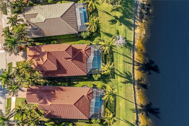 bird's eye view with a water view