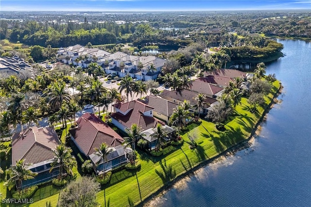 drone / aerial view with a water view