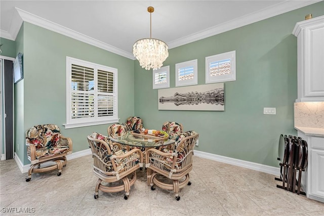 dining room with a chandelier, crown molding, and a healthy amount of sunlight