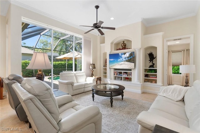 living room with built in shelves, light tile patterned floors, visible vents, ornamental molding, and a sunroom