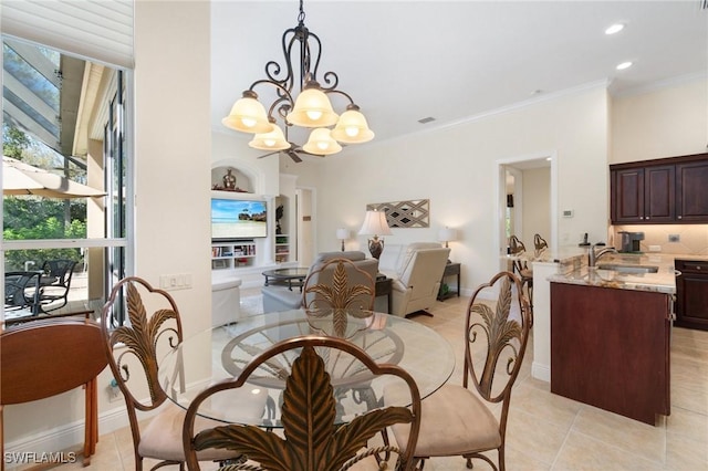 dining space featuring light tile patterned flooring, a notable chandelier, recessed lighting, baseboards, and crown molding