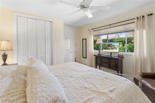 bedroom featuring ceiling fan and a closet