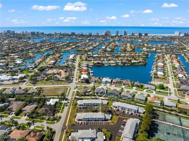 drone / aerial view with a water view