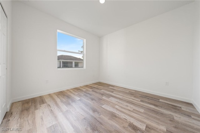 empty room featuring light hardwood / wood-style floors