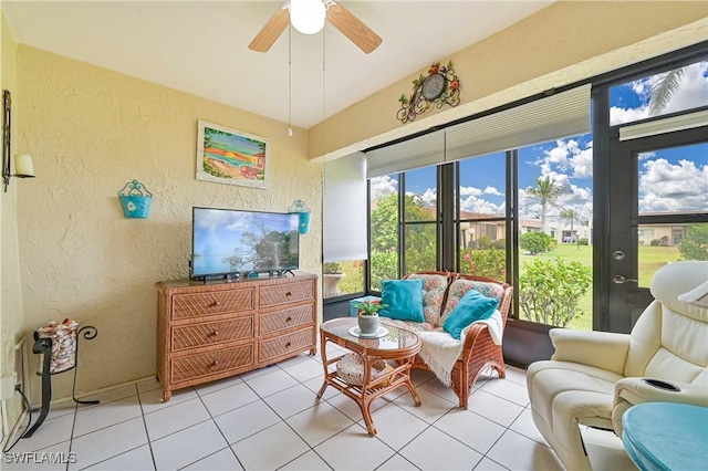 interior space featuring ceiling fan