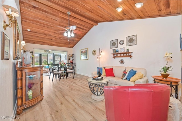 living area with baseboards, a ceiling fan, wood ceiling, beamed ceiling, and light wood-type flooring