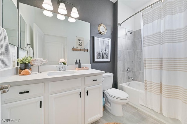 full bathroom featuring vanity, toilet, and shower / bath combo with shower curtain