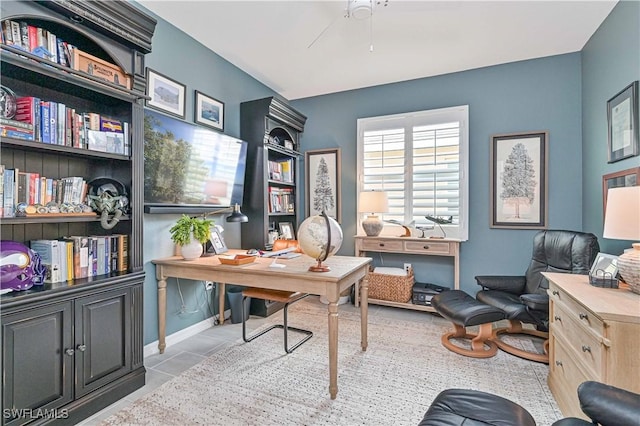 home office featuring light tile patterned floors