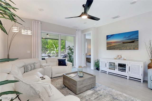 living room featuring ceiling fan