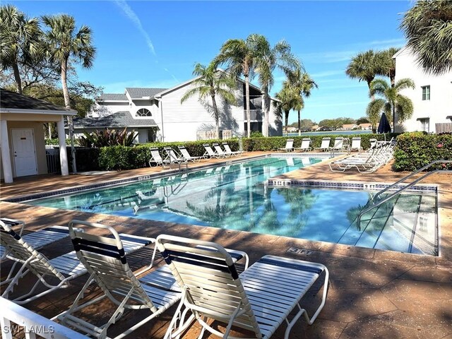 community pool with a patio