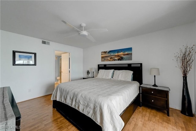 bedroom with ceiling fan, light wood-type flooring, connected bathroom, and visible vents