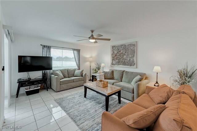 living room with light tile patterned floors and a ceiling fan