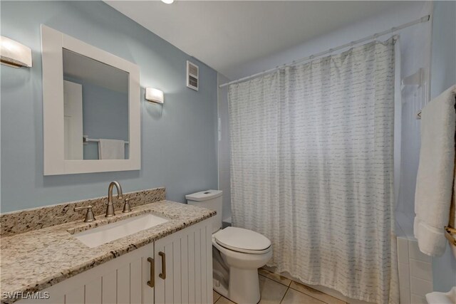 full bath featuring visible vents, toilet, tile patterned flooring, and vanity