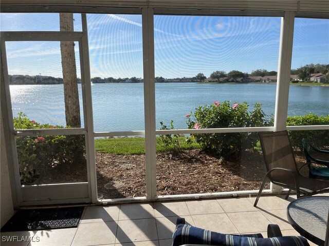 sunroom with a water view