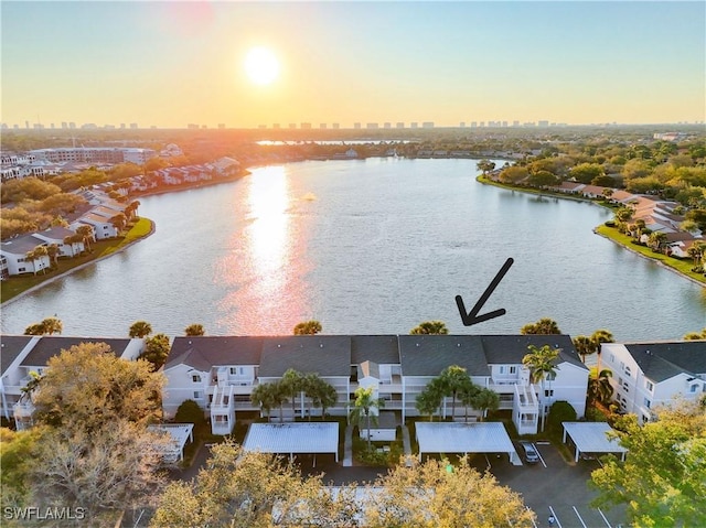 aerial view featuring a view of city and a water view