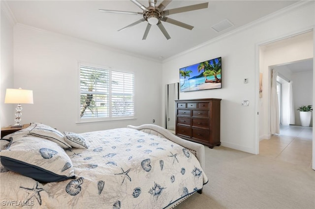 bedroom featuring light carpet, ceiling fan, baseboards, and crown molding