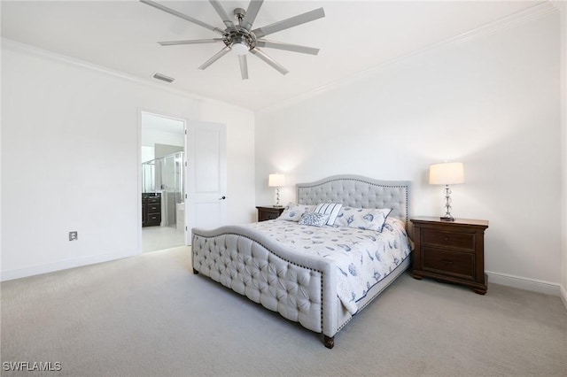 bedroom with light carpet, visible vents, baseboards, ensuite bath, and crown molding