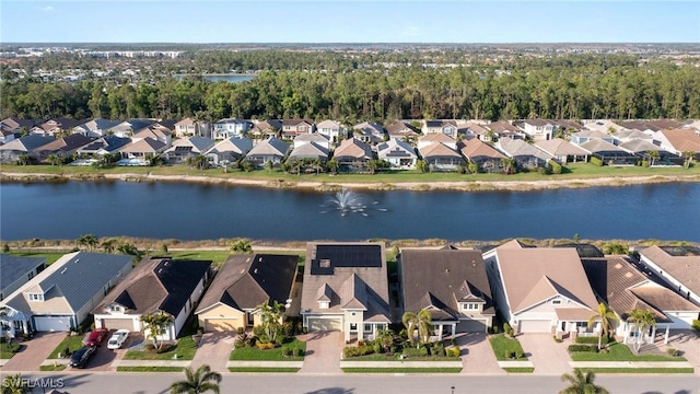 aerial view with a residential view and a water view