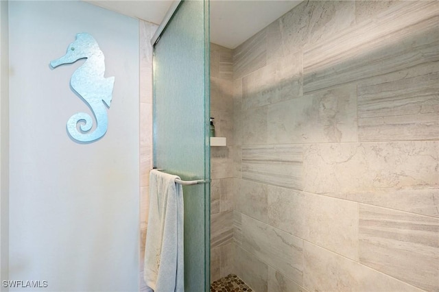180 Seaview Ct Unit 911, Marco Island, FL 34145 - bathroom with a stall shower