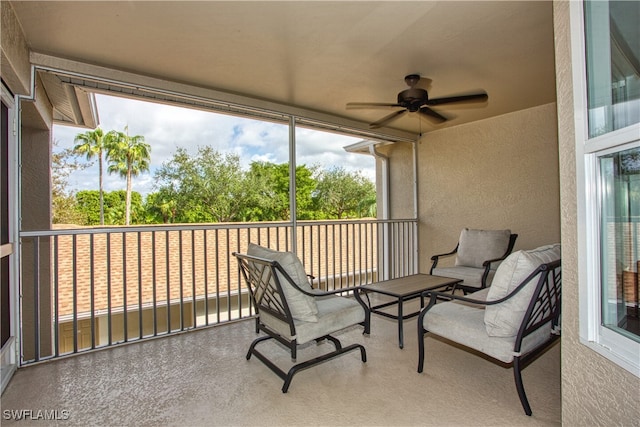 sunroom / solarium with ceiling fan