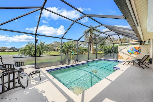 pool with a patio and a lanai