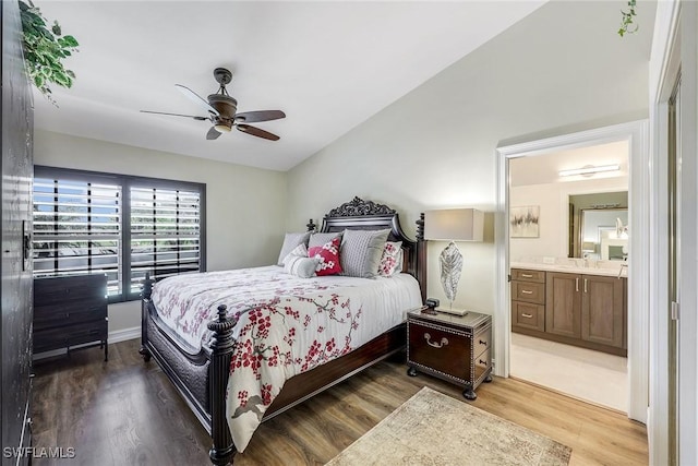 bedroom featuring ceiling fan, wood-type flooring, and connected bathroom