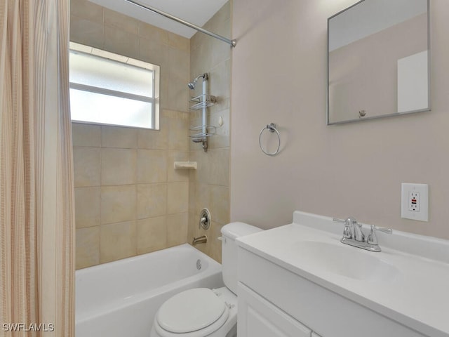 full bathroom featuring shower / washtub combination, vanity, and toilet