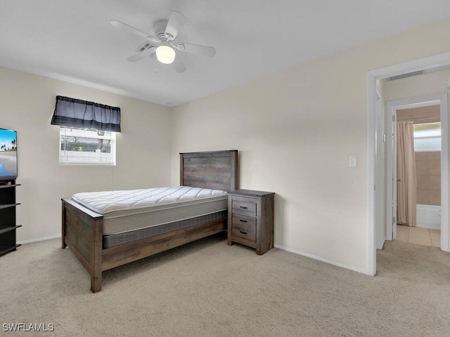 bedroom with light carpet, multiple windows, and visible vents