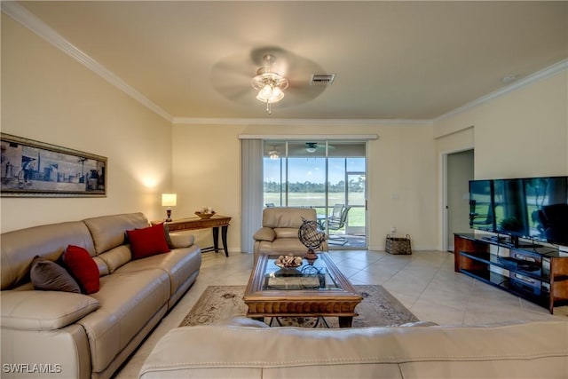 living area with crown molding, light tile patterned floors, visible vents, a ceiling fan, and baseboards