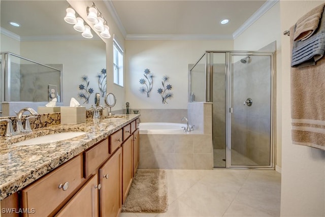 full bathroom with ornamental molding, a garden tub, a sink, and double vanity