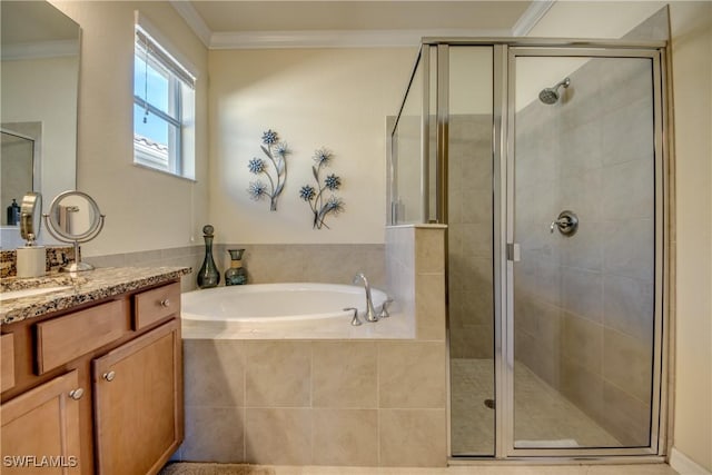 bathroom with ornamental molding, vanity, a shower stall, and a bath