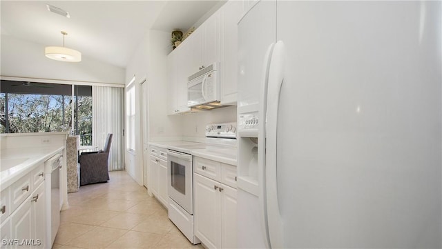 kitchen with light stone counters, light tile patterned flooring, white appliances, white cabinetry, and pendant lighting