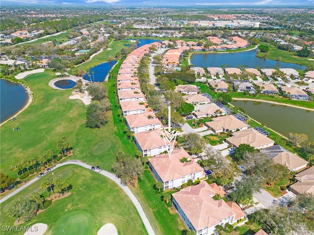 bird's eye view with a residential view, view of golf course, and a water view