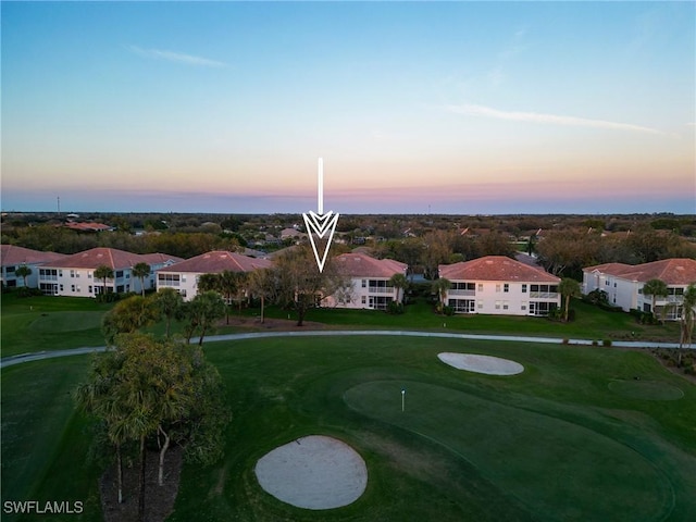 aerial view featuring golf course view and a residential view