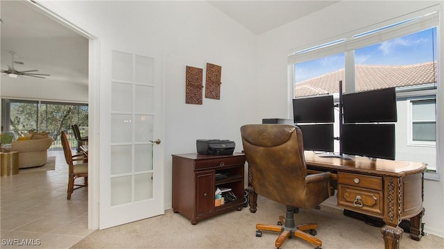 office area with light tile patterned flooring and plenty of natural light