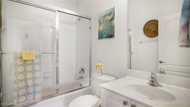 full bath featuring shower / bath combination with glass door, vanity, and toilet